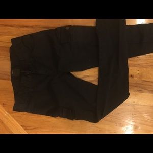 Black skinny jeans with thigh pockets